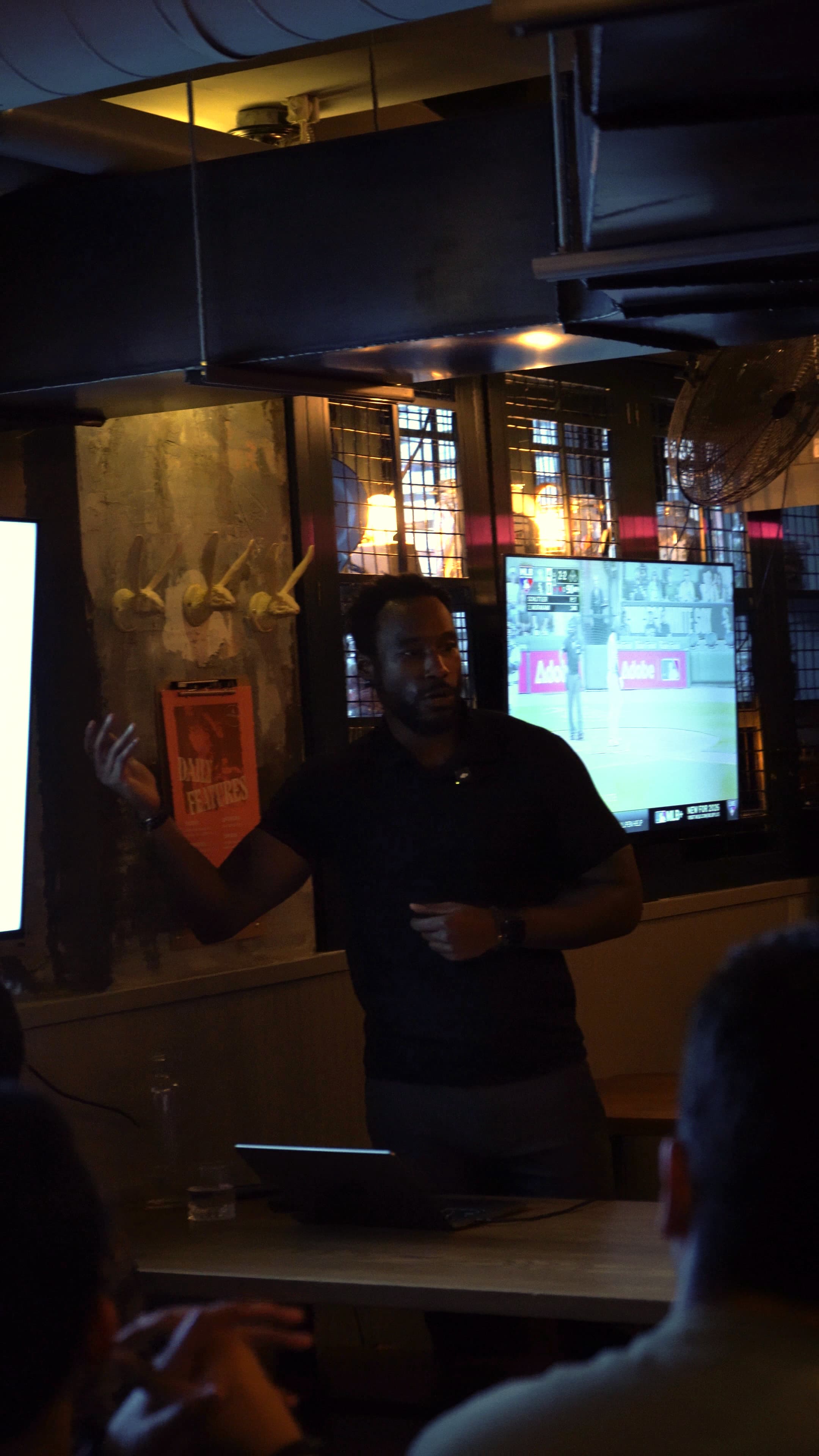 Prentiss Dantzler speaking at Talks Over Draft